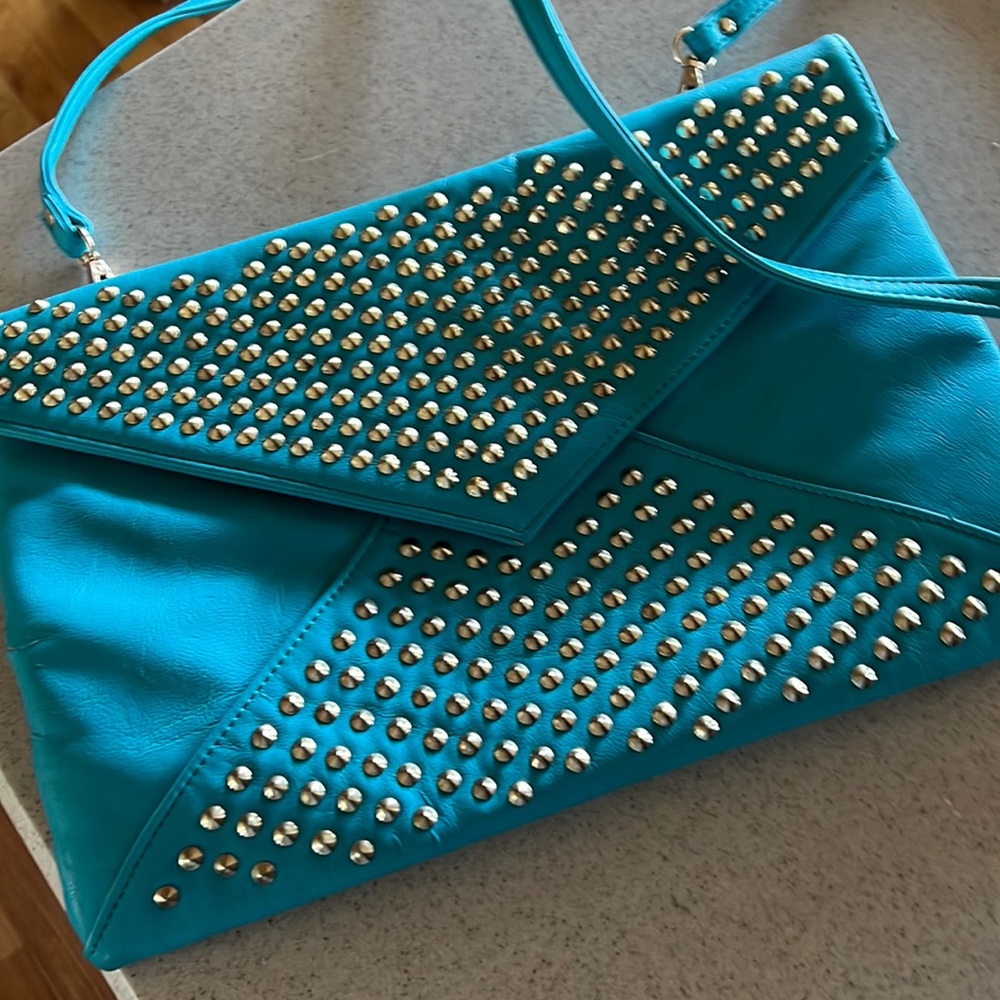 Brand new tortoise faux leather shoulder bag.silverstudsremovable shoulder strap